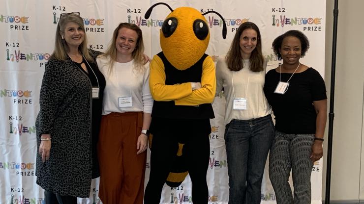 Petrina Baxter (far right), a teacher at Kennesaw Mountain High School, attended the K-12 Inventure Prize awards ceremony with her students Nathan McKee and William Tyler of team "Chorder," who won the Consumer Goods Award at the event.